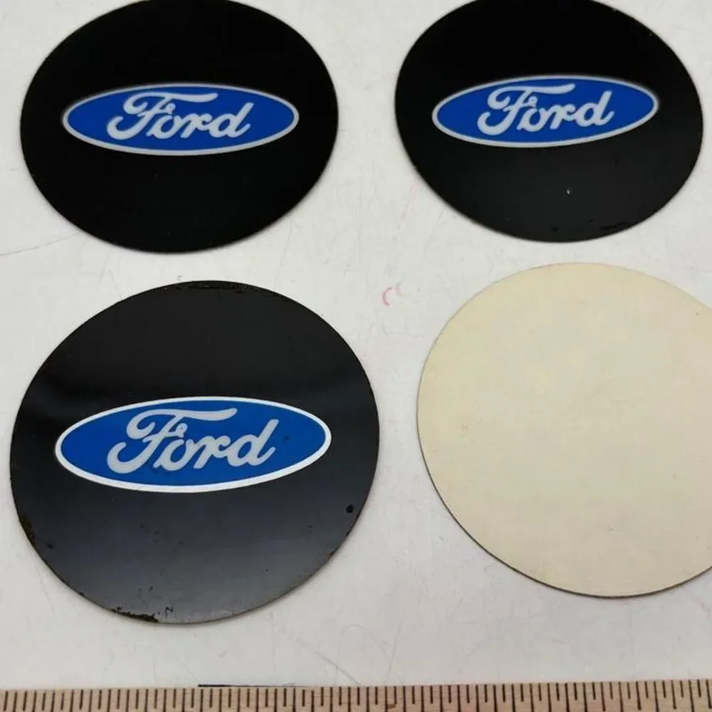 Ford center caps with blue oval logo